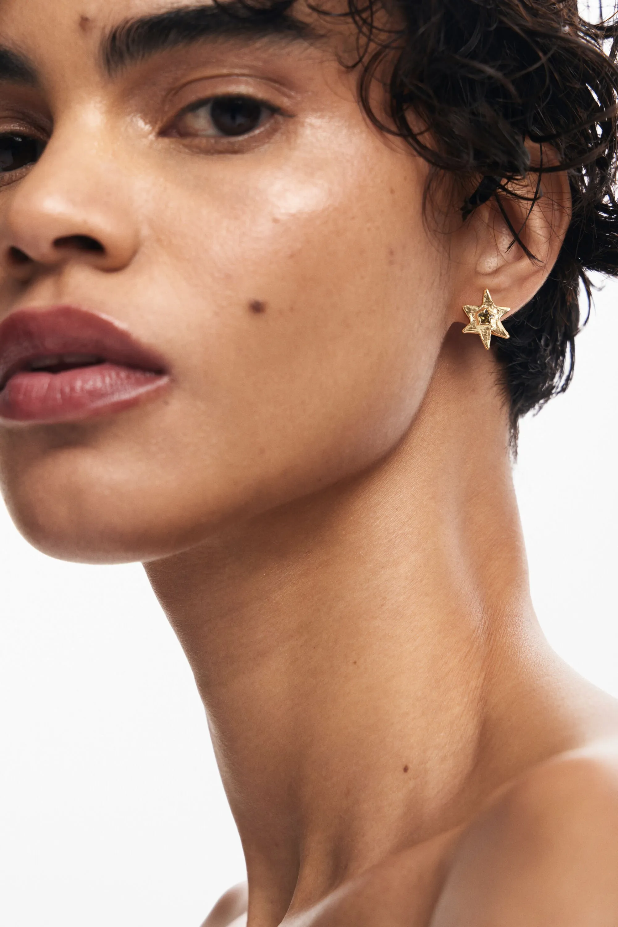 Pendientes estrella baño oro Zalio