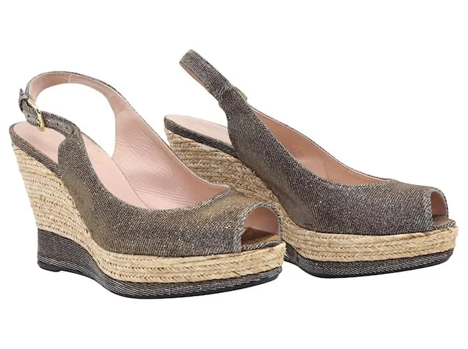 Stuart Weitzman Jean Peeptoe Cork Wedge en cuero plateado con purpurina Plata Metálico 